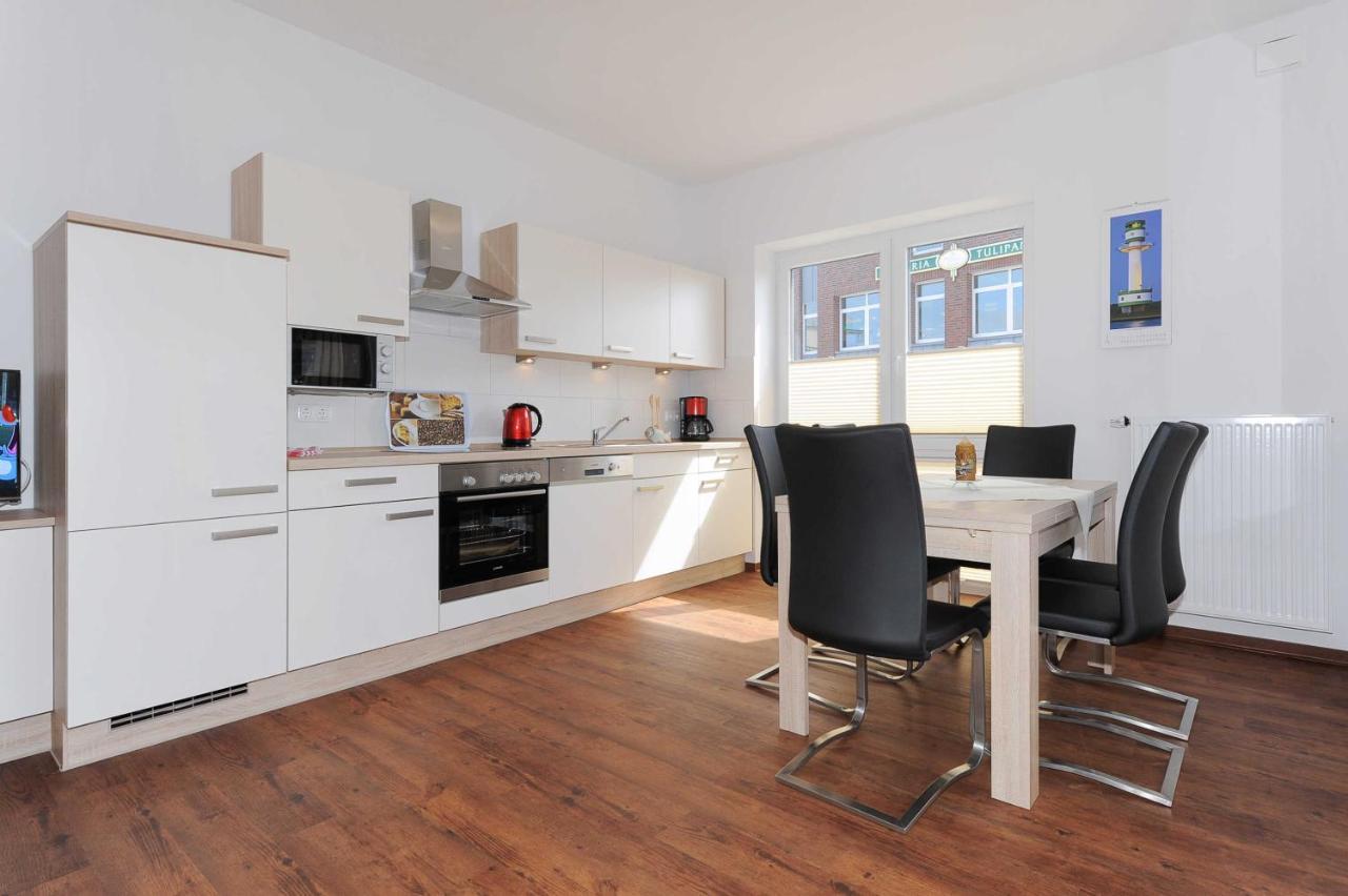 Appartement Haus Leuchtturm à Bensersiel Extérieur photo