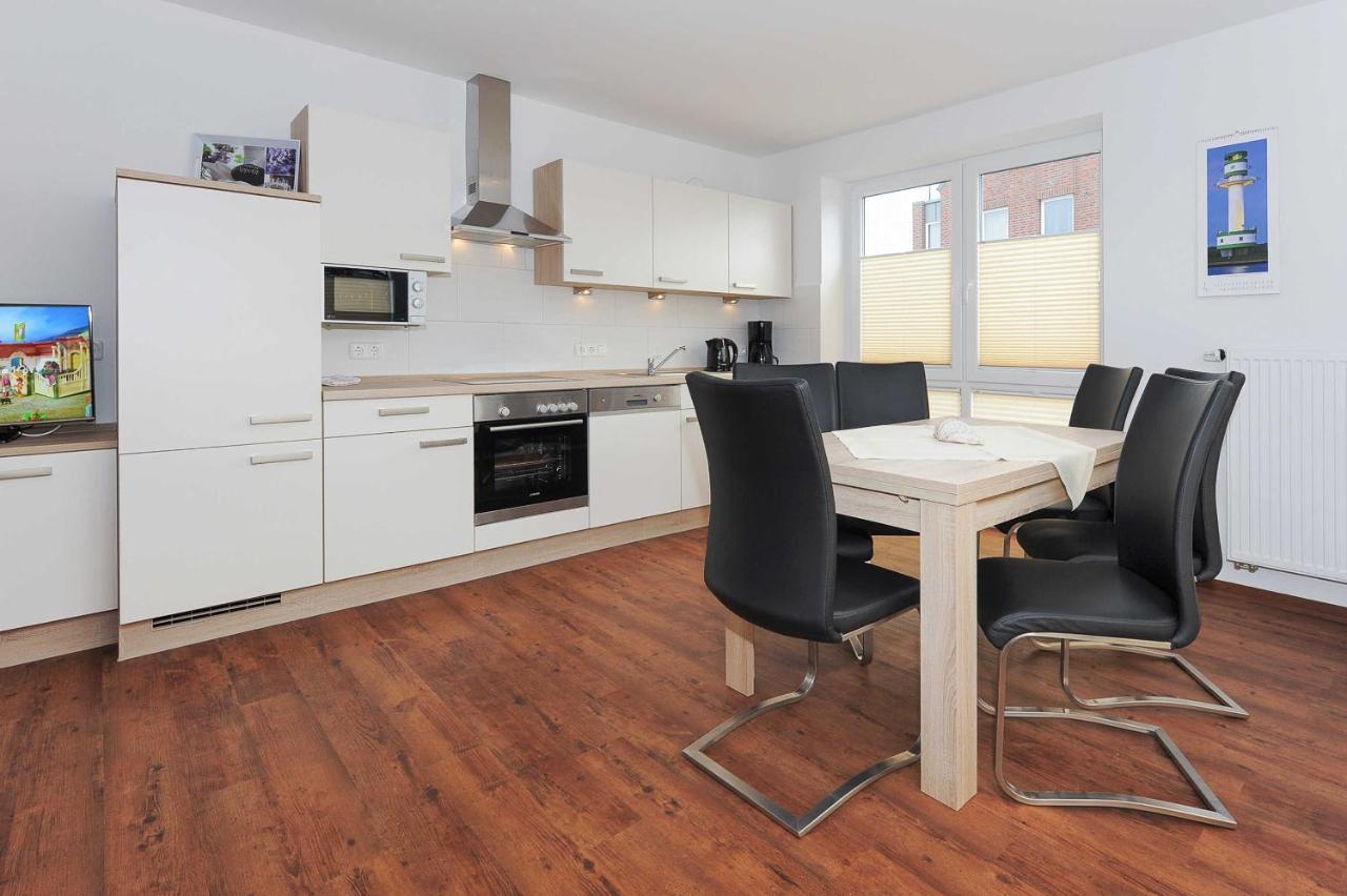 Appartement Haus Leuchtturm à Bensersiel Extérieur photo