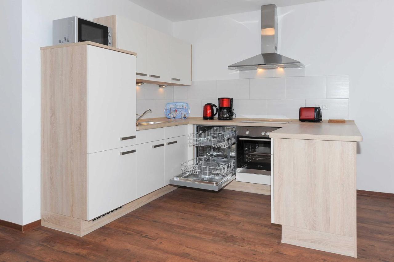 Appartement Haus Leuchtturm à Bensersiel Extérieur photo